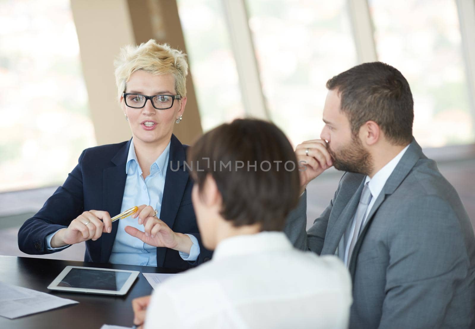 business people group on meeting at office by dotshock