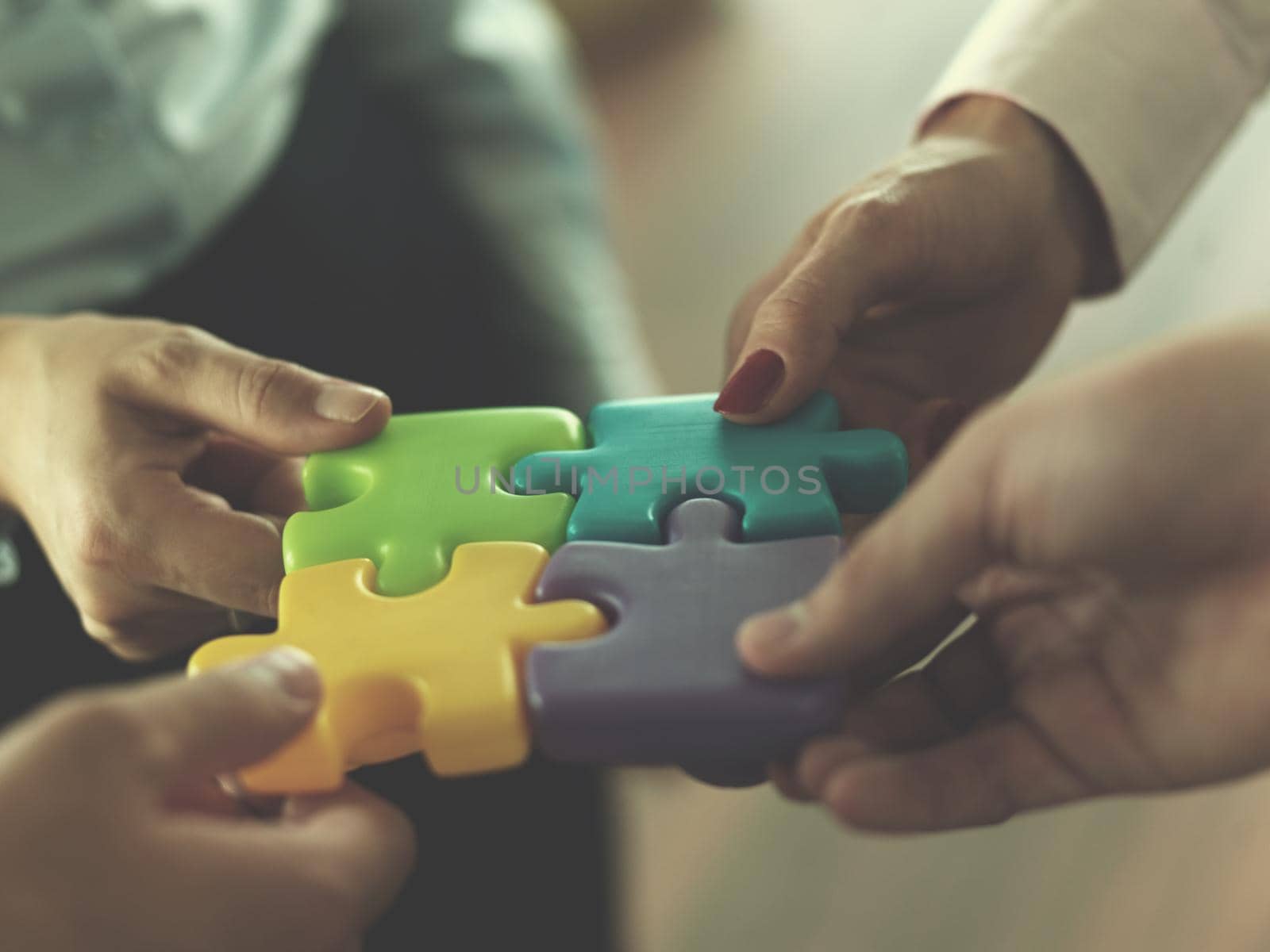 business people group assembling jigsaw puzzle by dotshock