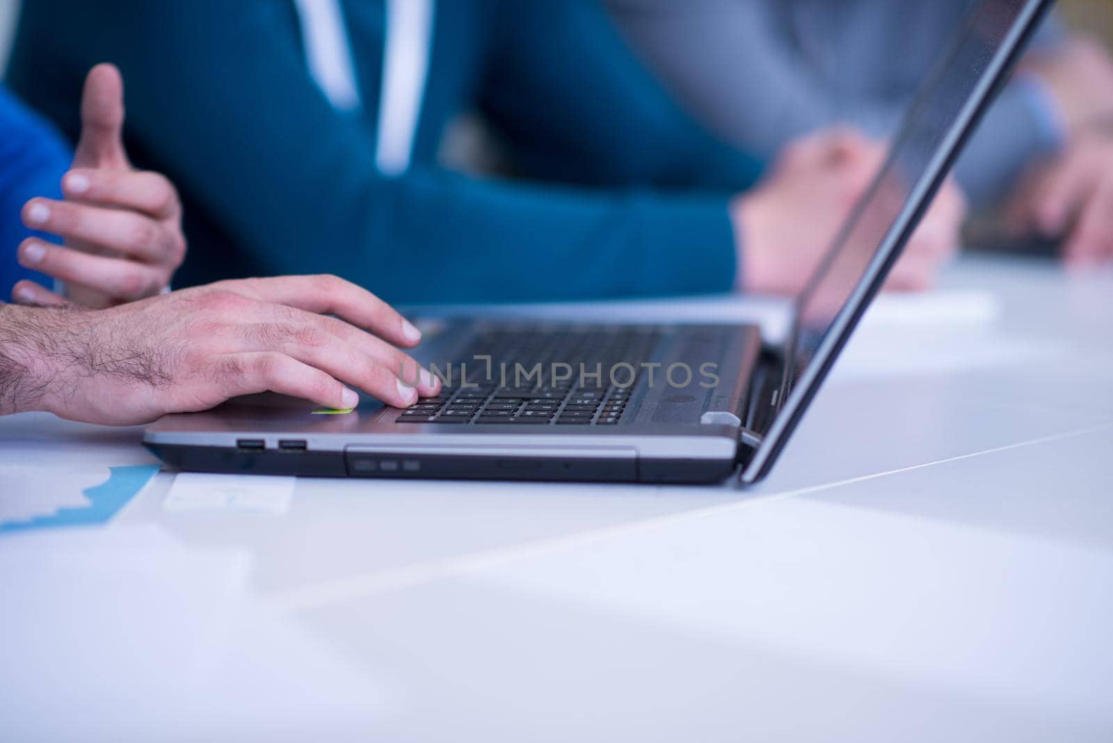 business people hands typing on laptop computer keyboard during the seminar at conference room