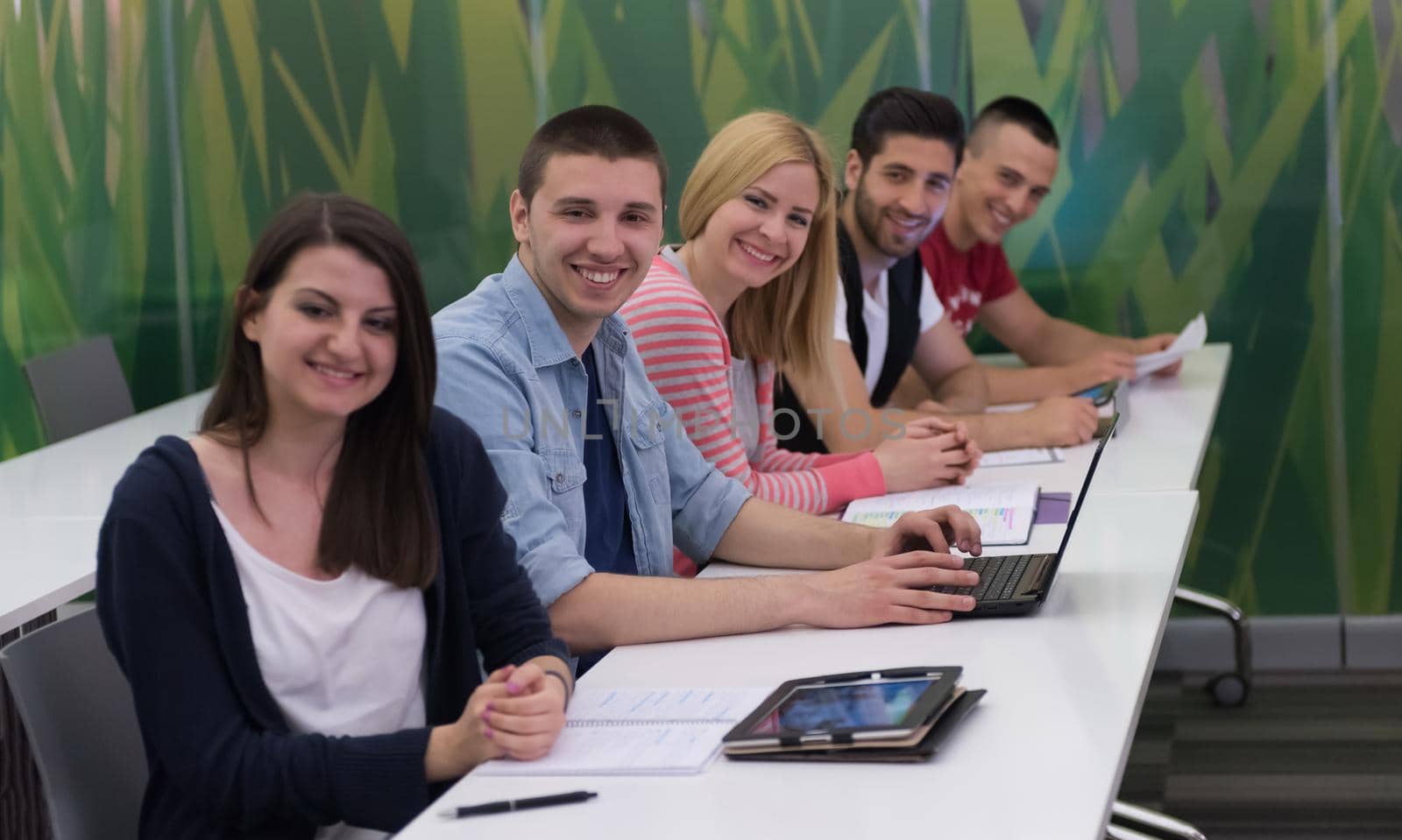 students group study together in school classroom and working together homework project