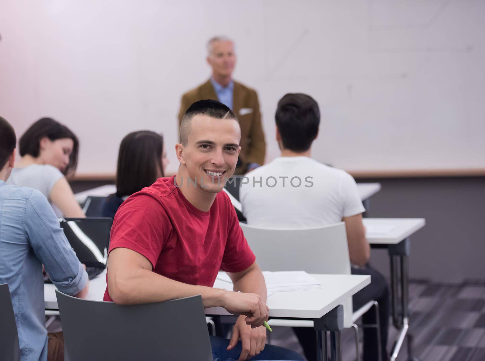 technology students group in computer lab school  classroom working on