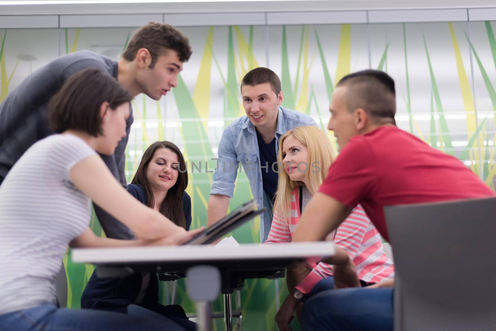 students group study together in school classroom and working together homework project