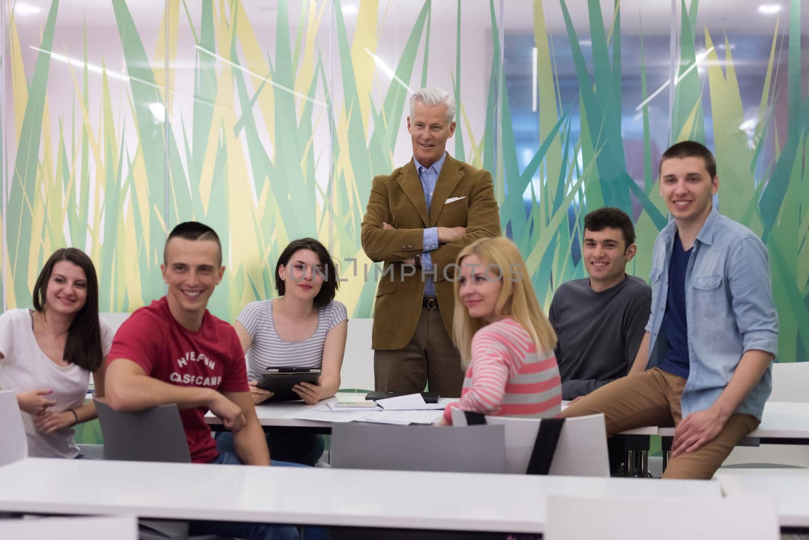 portrait of  teacher with students group in background by dotshock