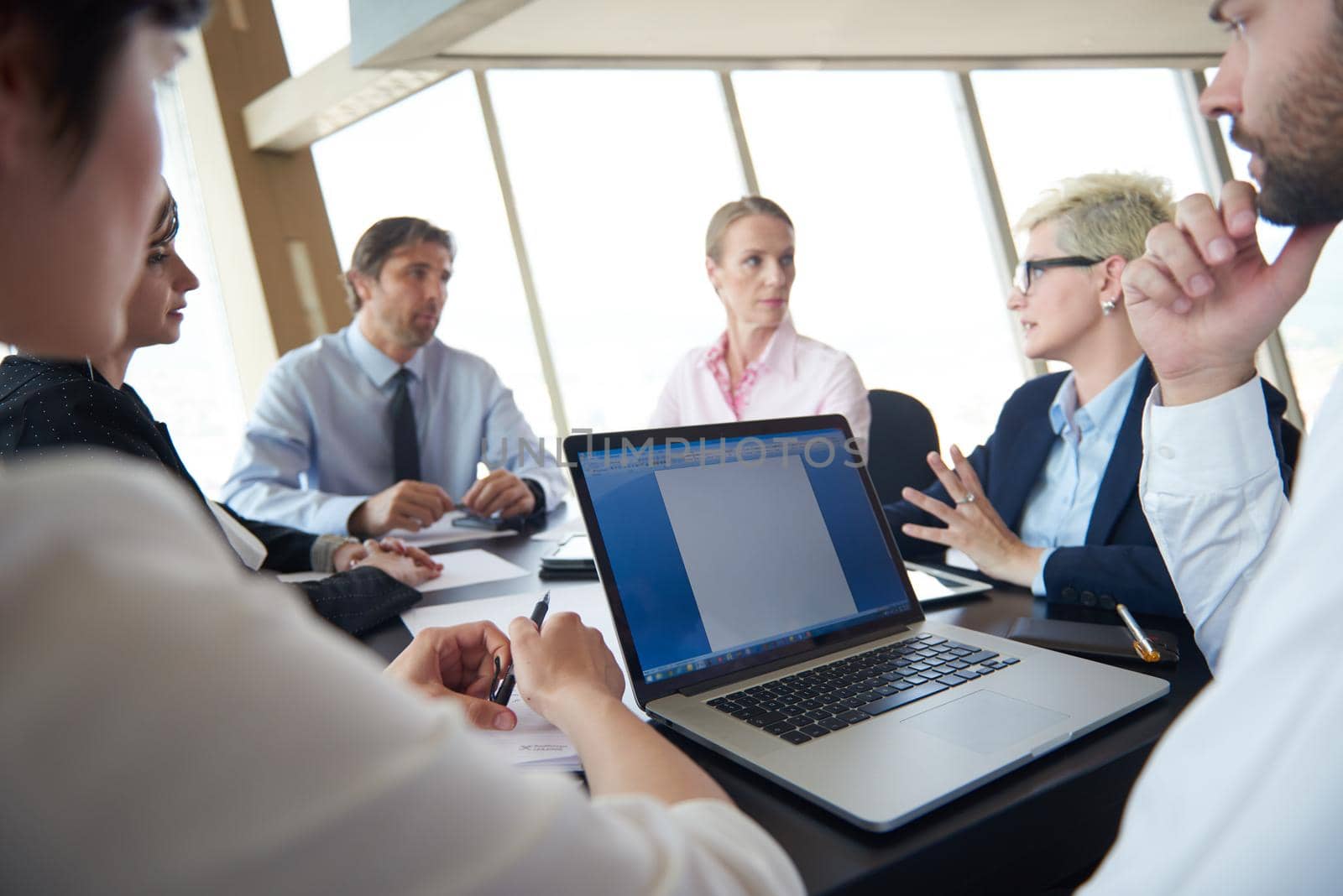 young business people group have meeting and working in modern bright office indoors