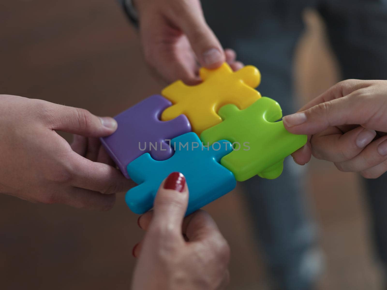 business people group assembling jigsaw puzzle by dotshock
