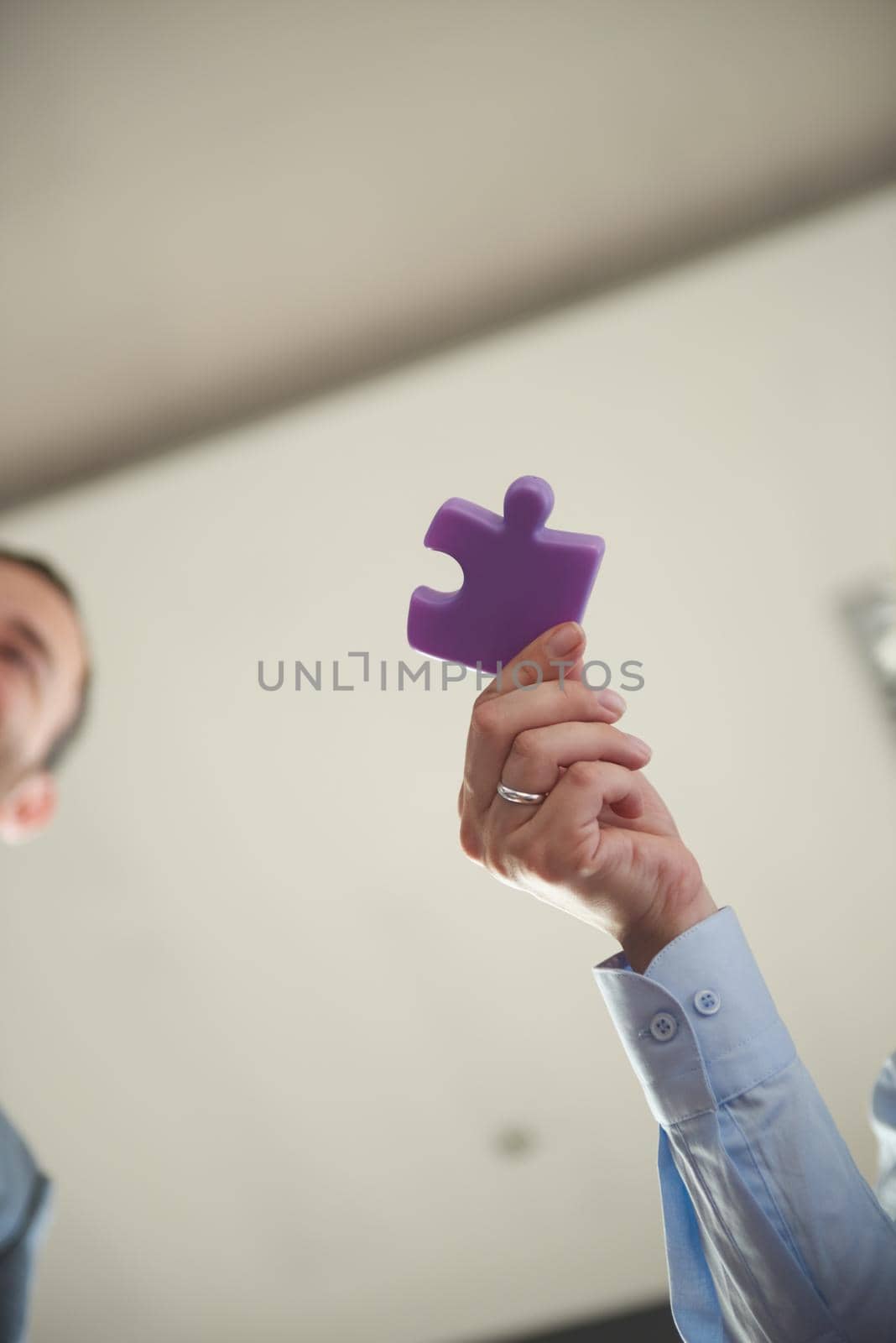 business people group assembling jigsaw puzzle by dotshock