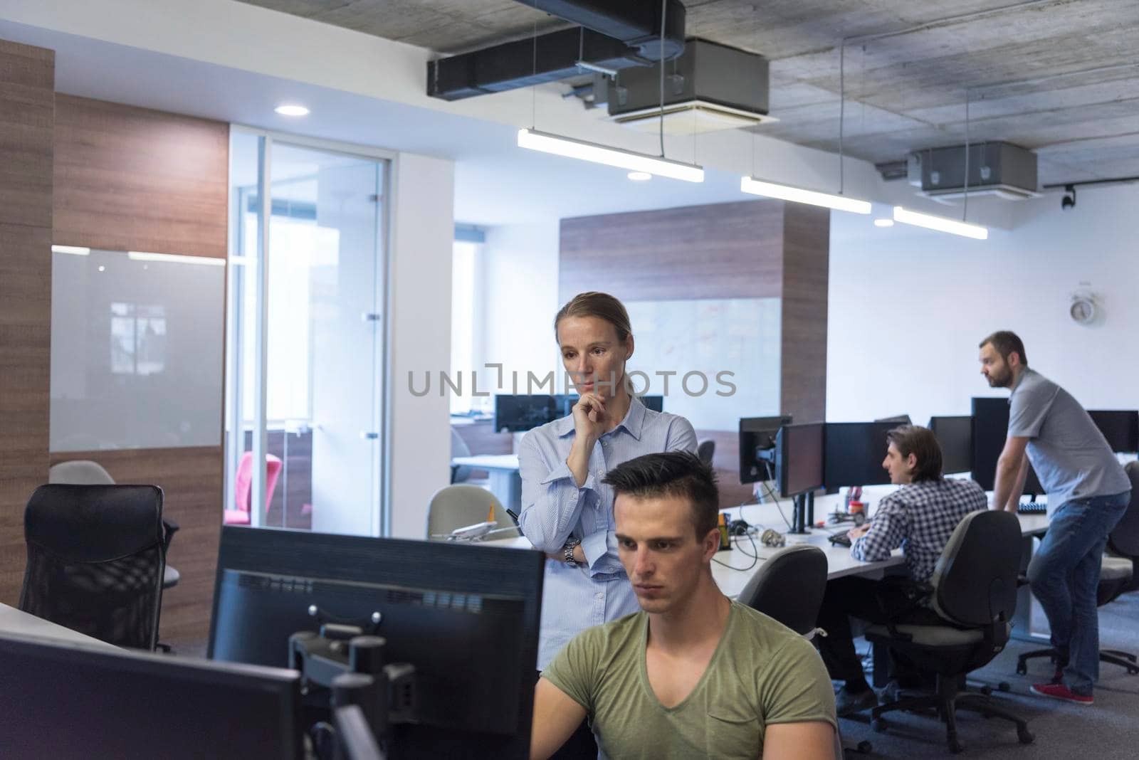 business couple working together on project at modern startup office