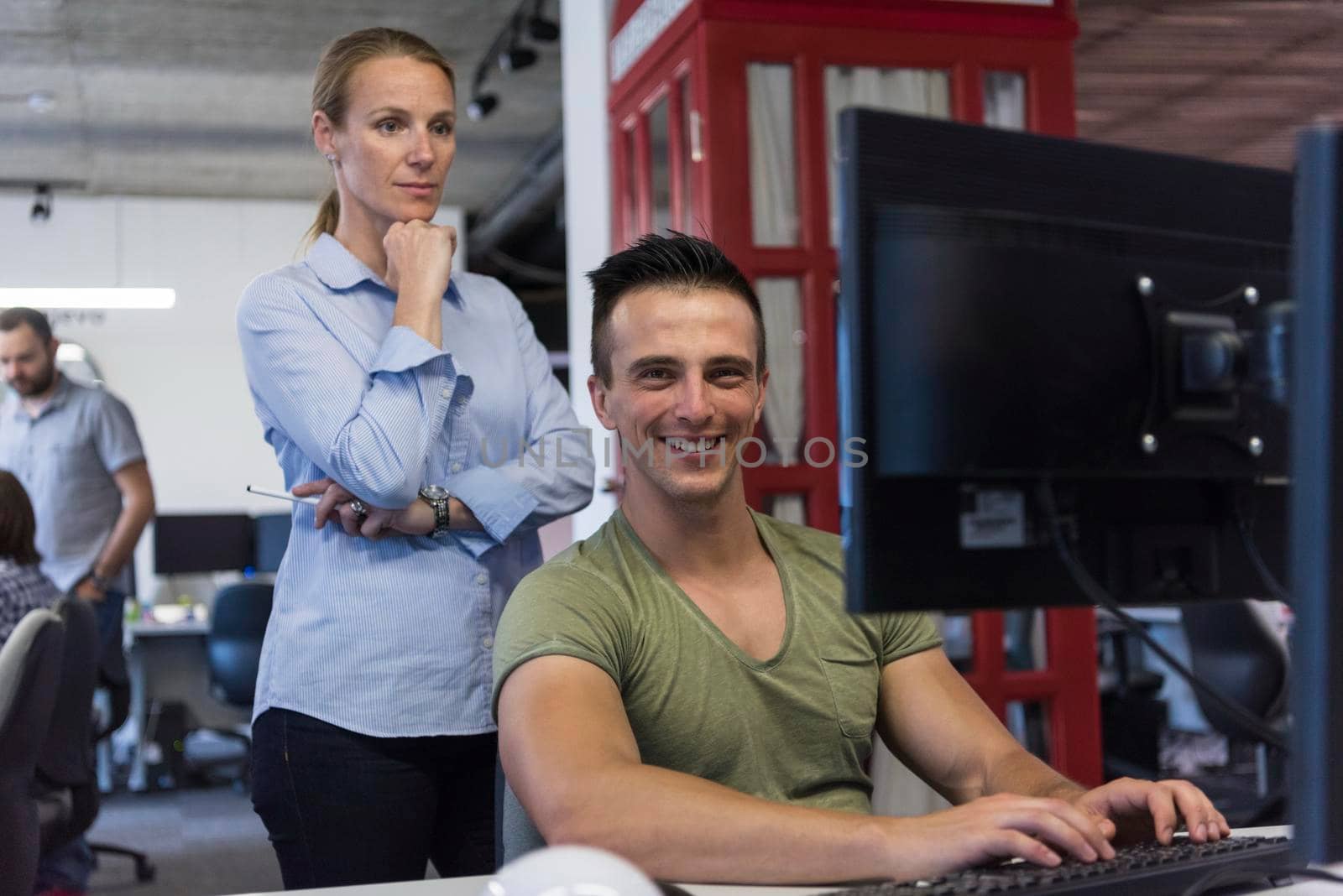 business couple working together on project at modern startup office