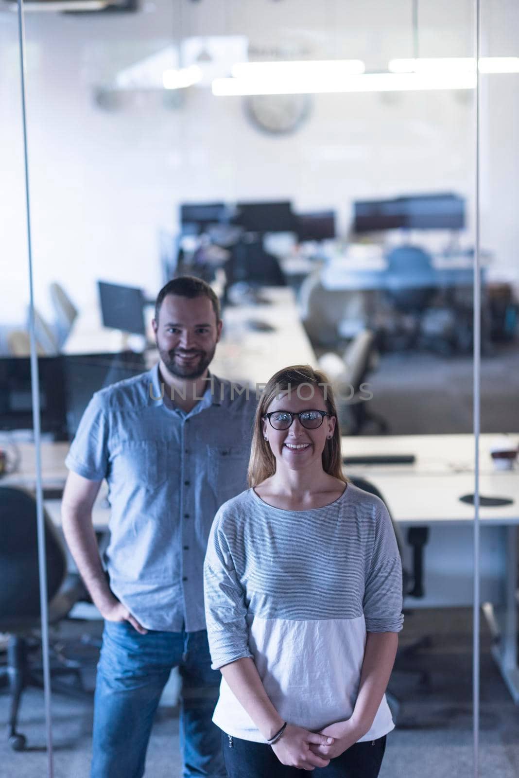 business couple working together on project at modern startup office