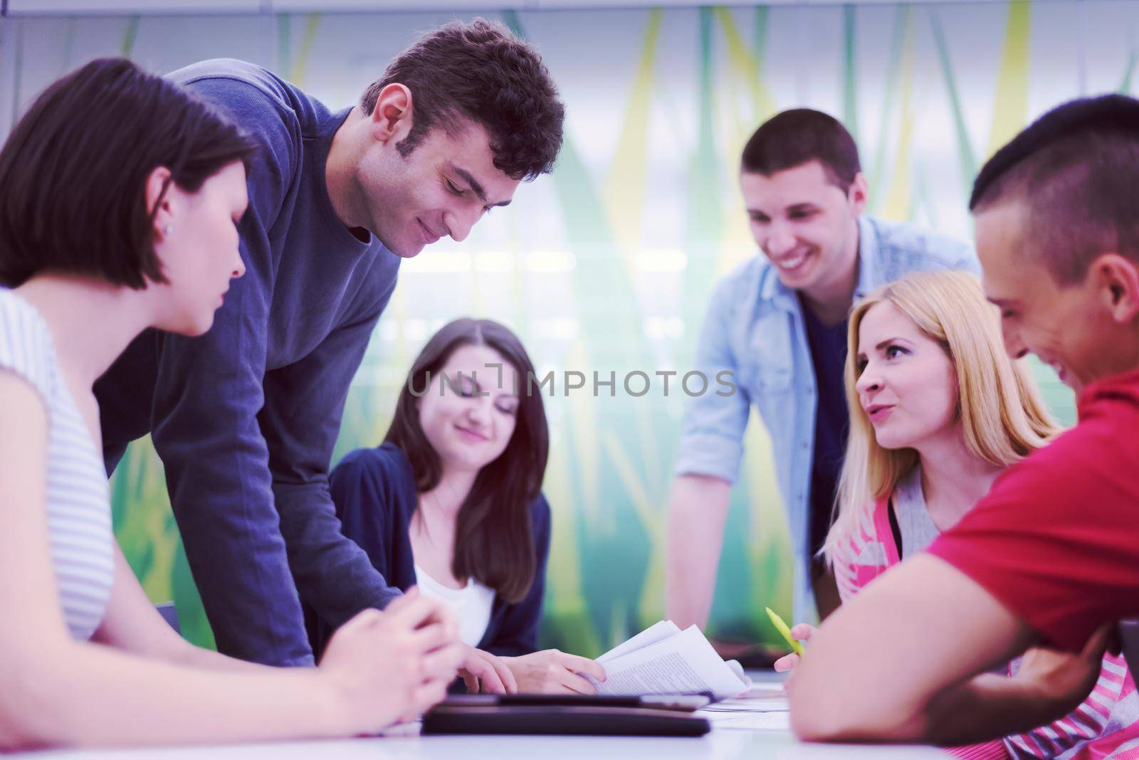 students group study together in school classroom and working together homework project