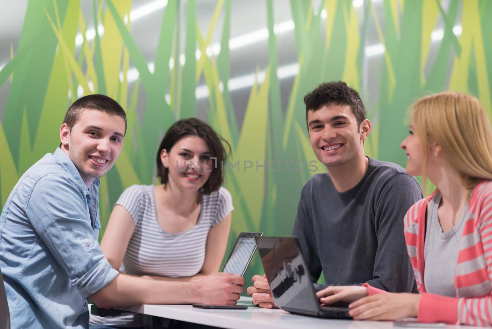 students group study together in school classroom and working together homework project