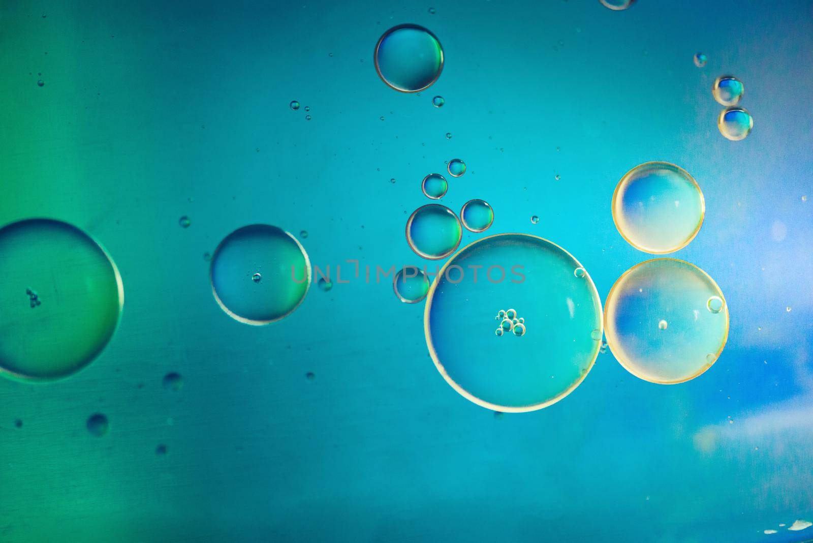 Oil drops in water. Abstract psychedelic pattern image multicolored. Abstract background with colorful gradient colors. DOF