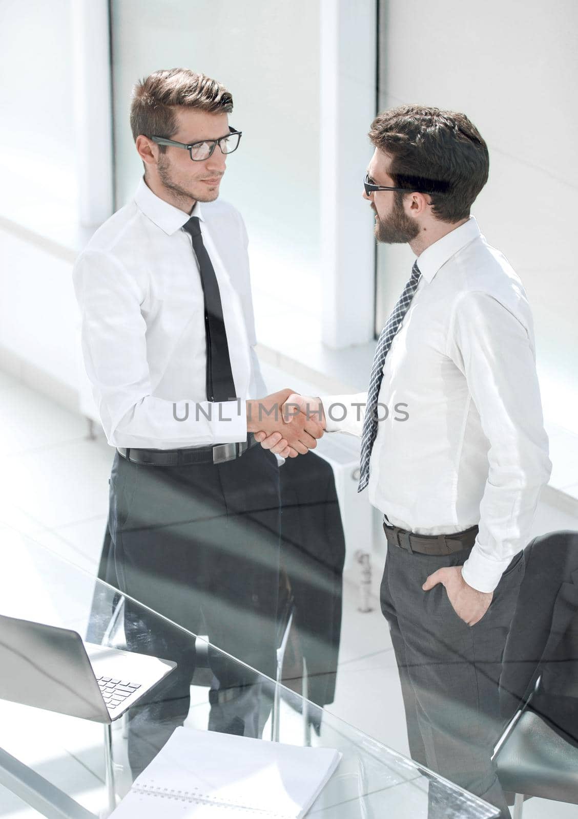 close up.handshake business people in the office.business concept