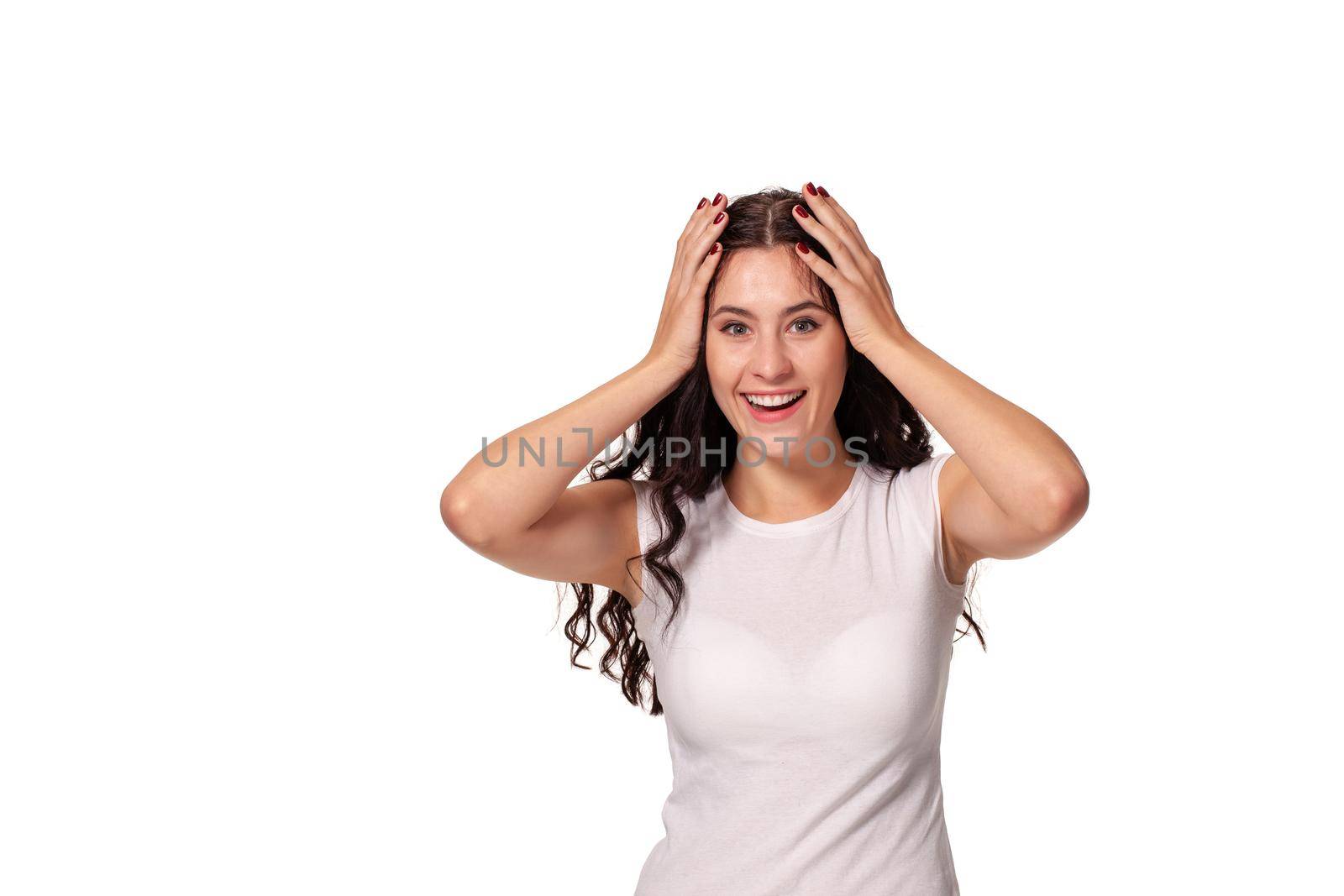 Beautiful young girl is pointing at herself to say am I on the white background