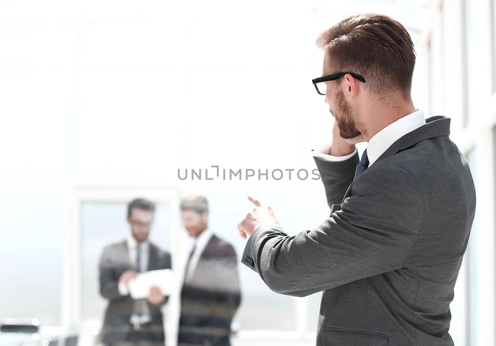 business man showing to the Bank office .photo with copy space