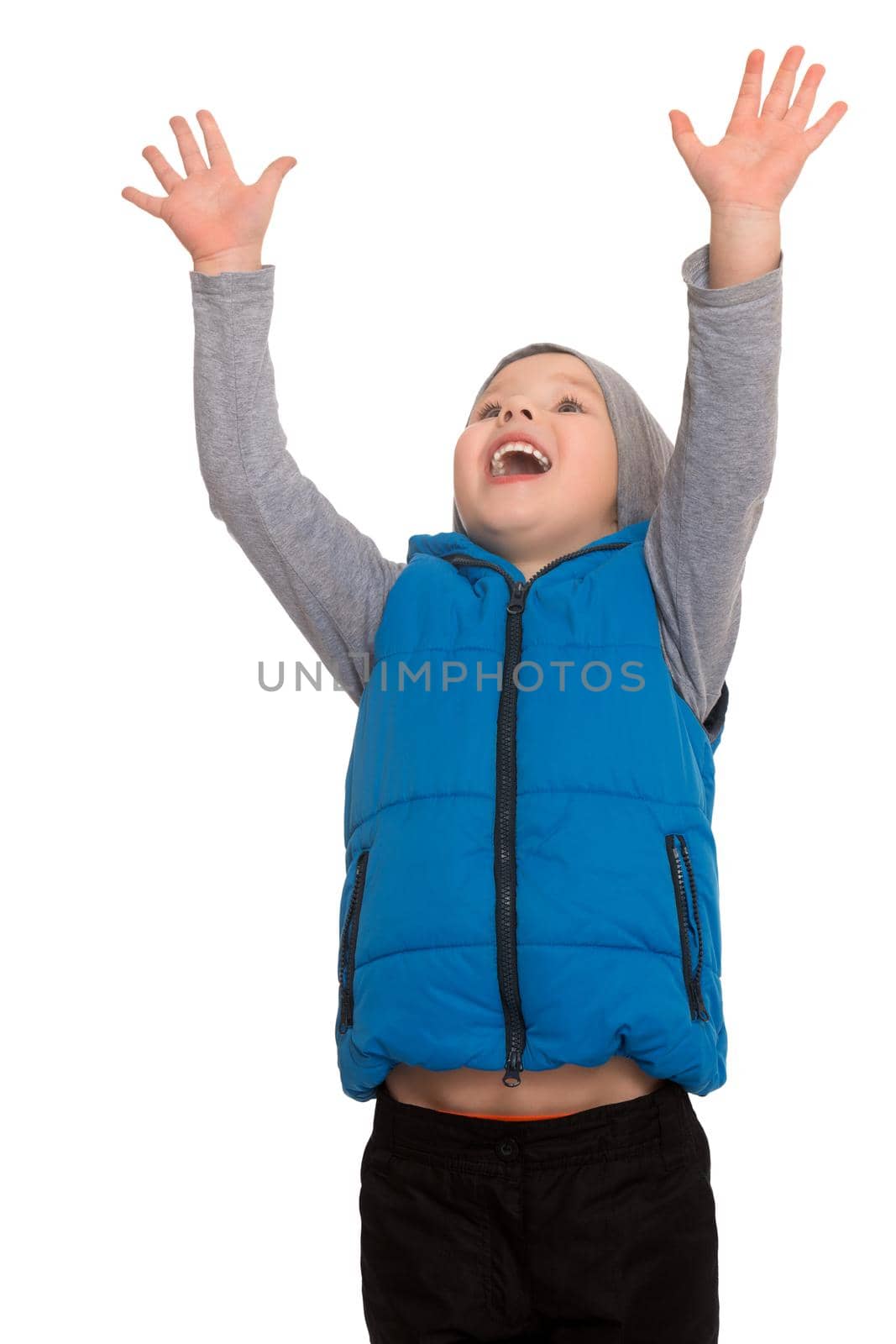 Flashy little boy happily raised his hands up. Close-up - Isolated on white background