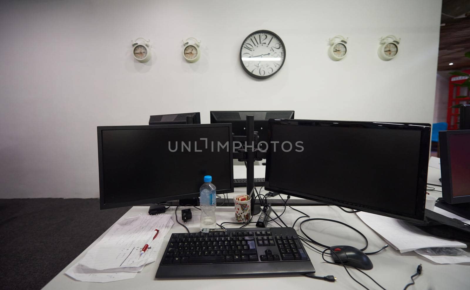 dual monitor screen and laptop computer at modern office indoors, startup company software develop  technology