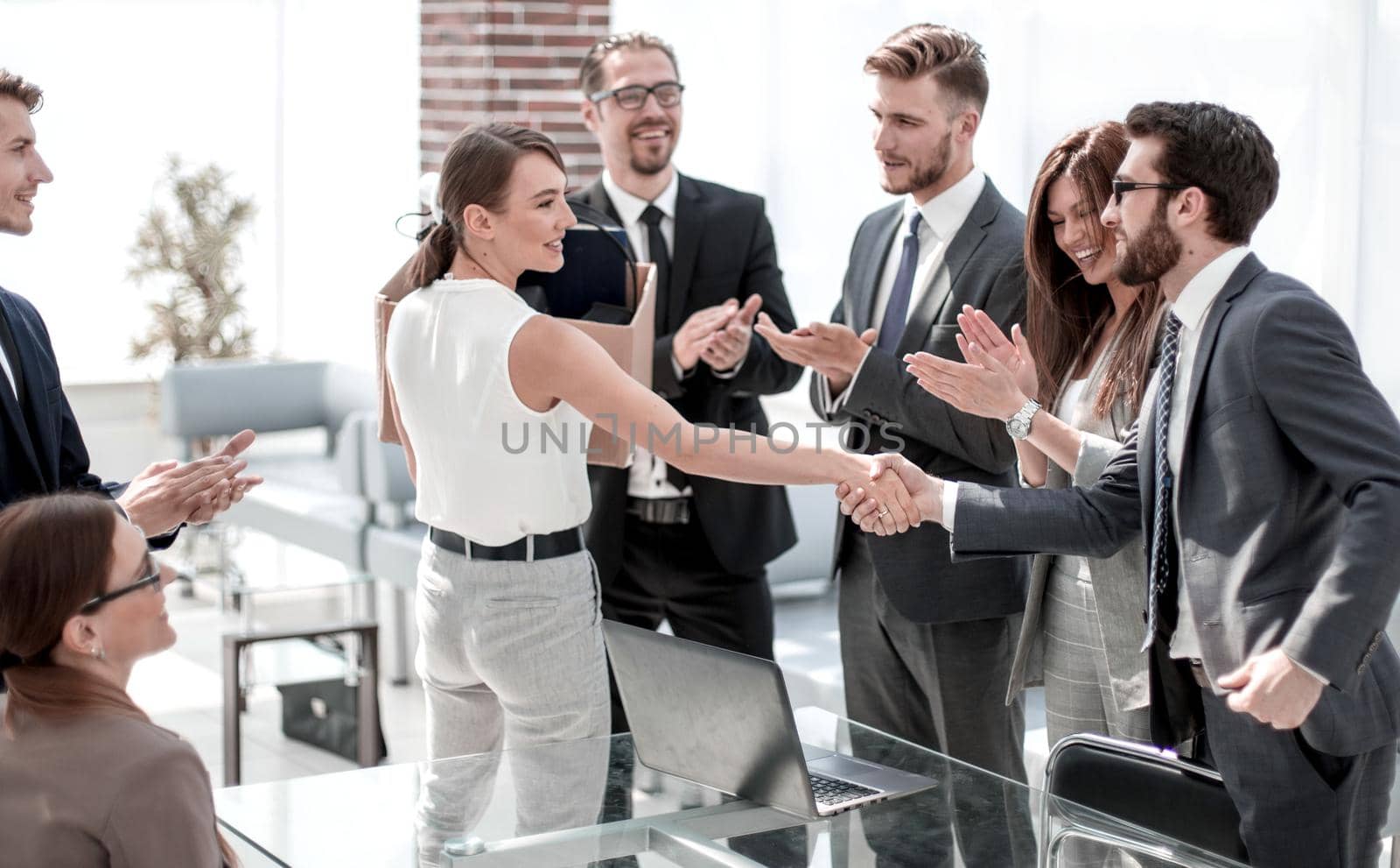 young business woman meets colleagues in the office .business concept