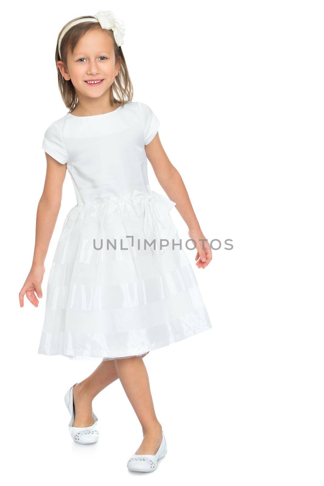 Cute little girl in fancy white dress - Isolated on white background
