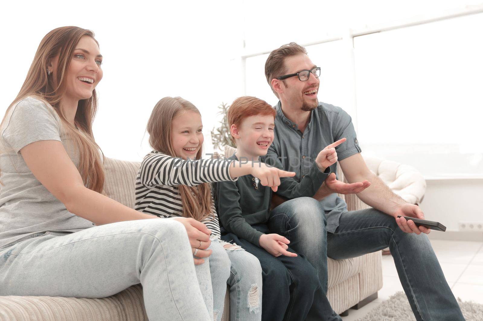 happy family watching their favorite TV show.photo with copy space