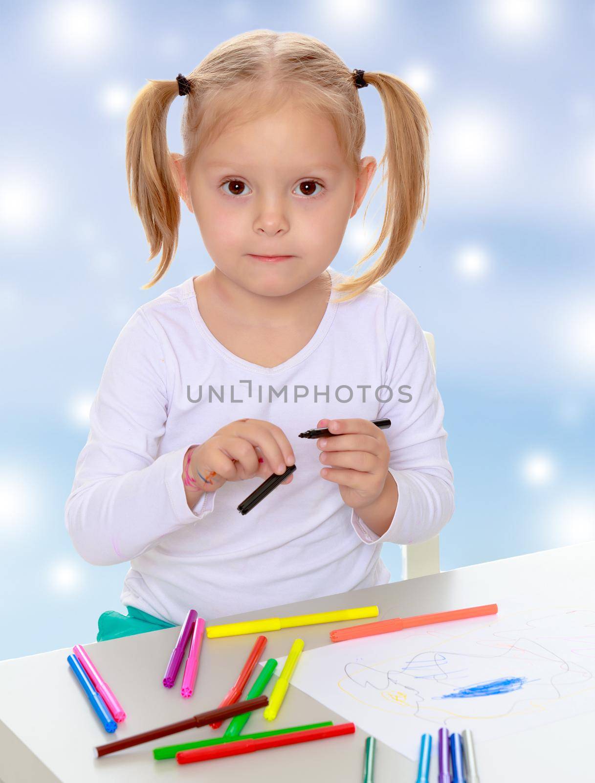 The girl draws with markers by kolesnikov_studio