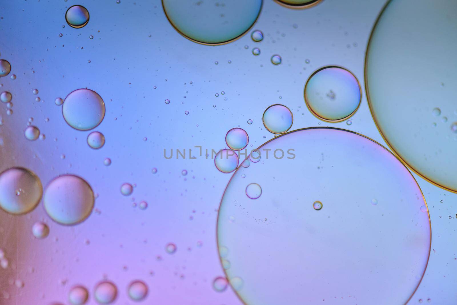 Multicolored abstract background picture made with oil, water and soap by anytka