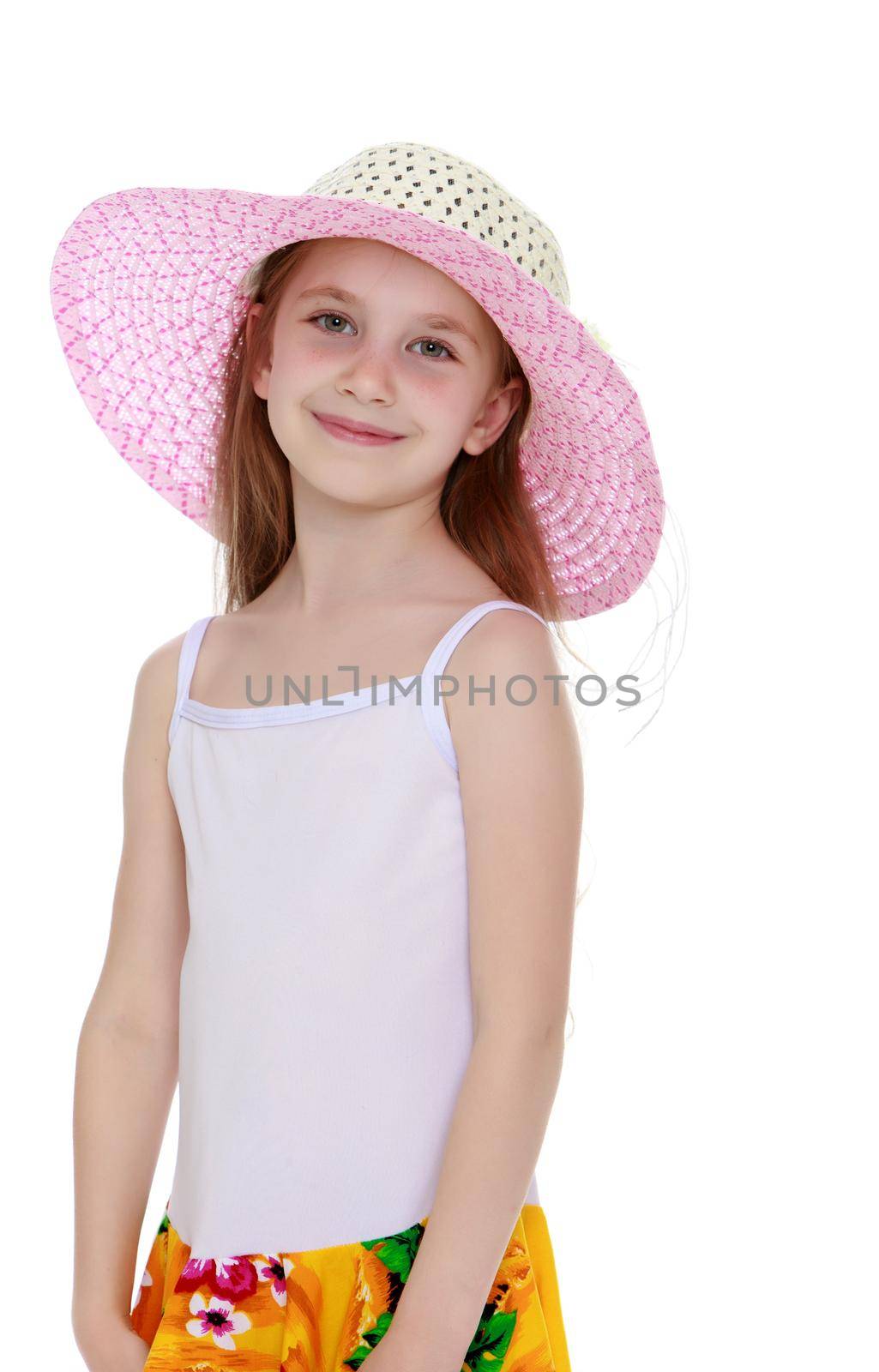Cute little girl in pink hat and white tank top without a pattern . Close-up - Isolated on white background