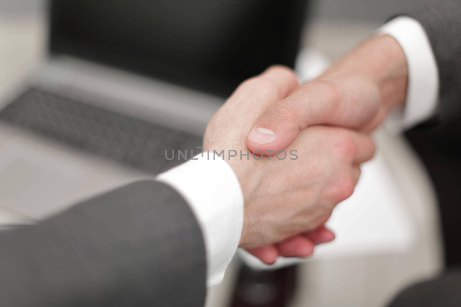 close up. handshake business people.the concept of cooperation