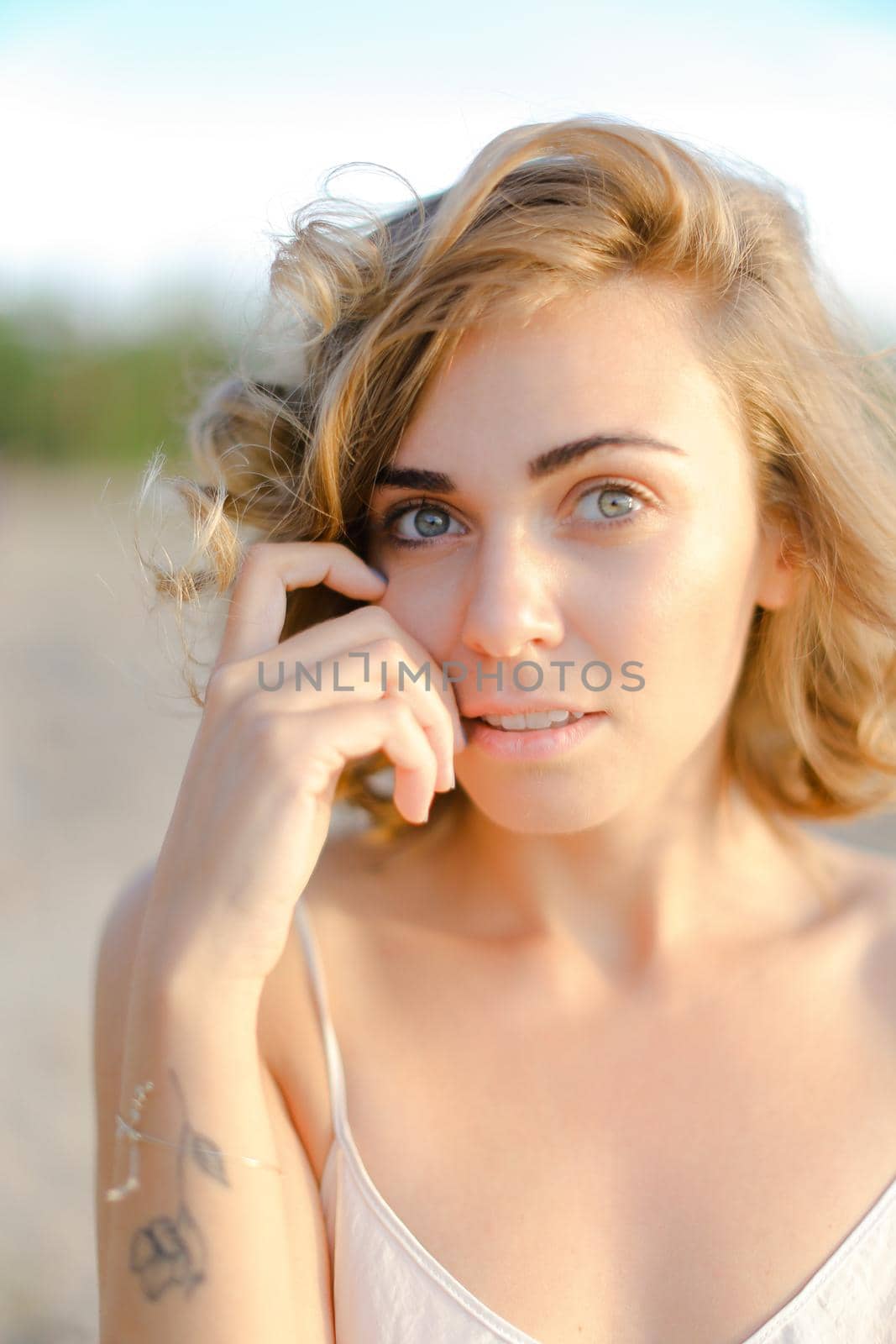 Close up portrait of young blonde woman without makeup. Concept of natural beauty and feamale person.