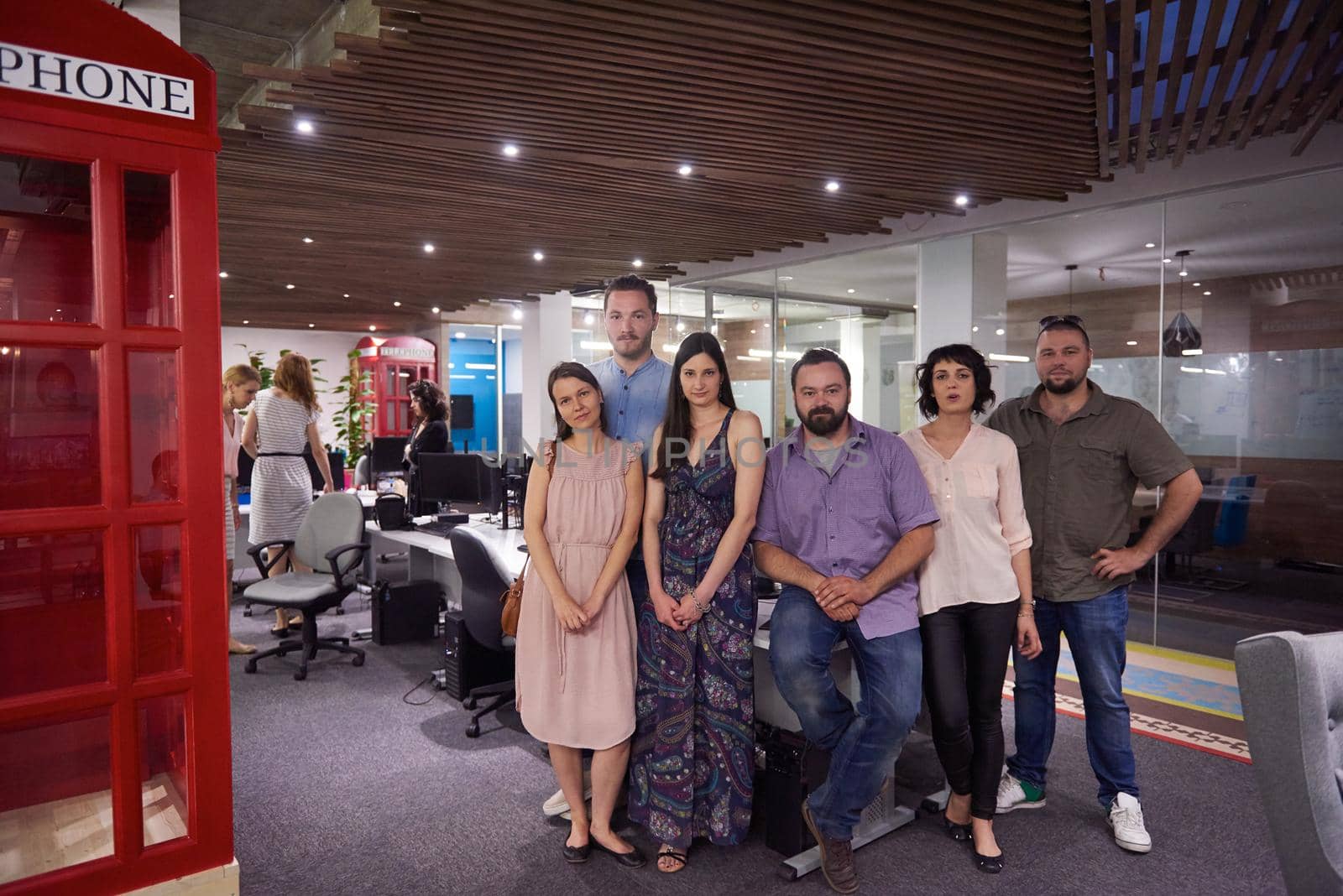 portrait of young successful startup business team at modern office indoors