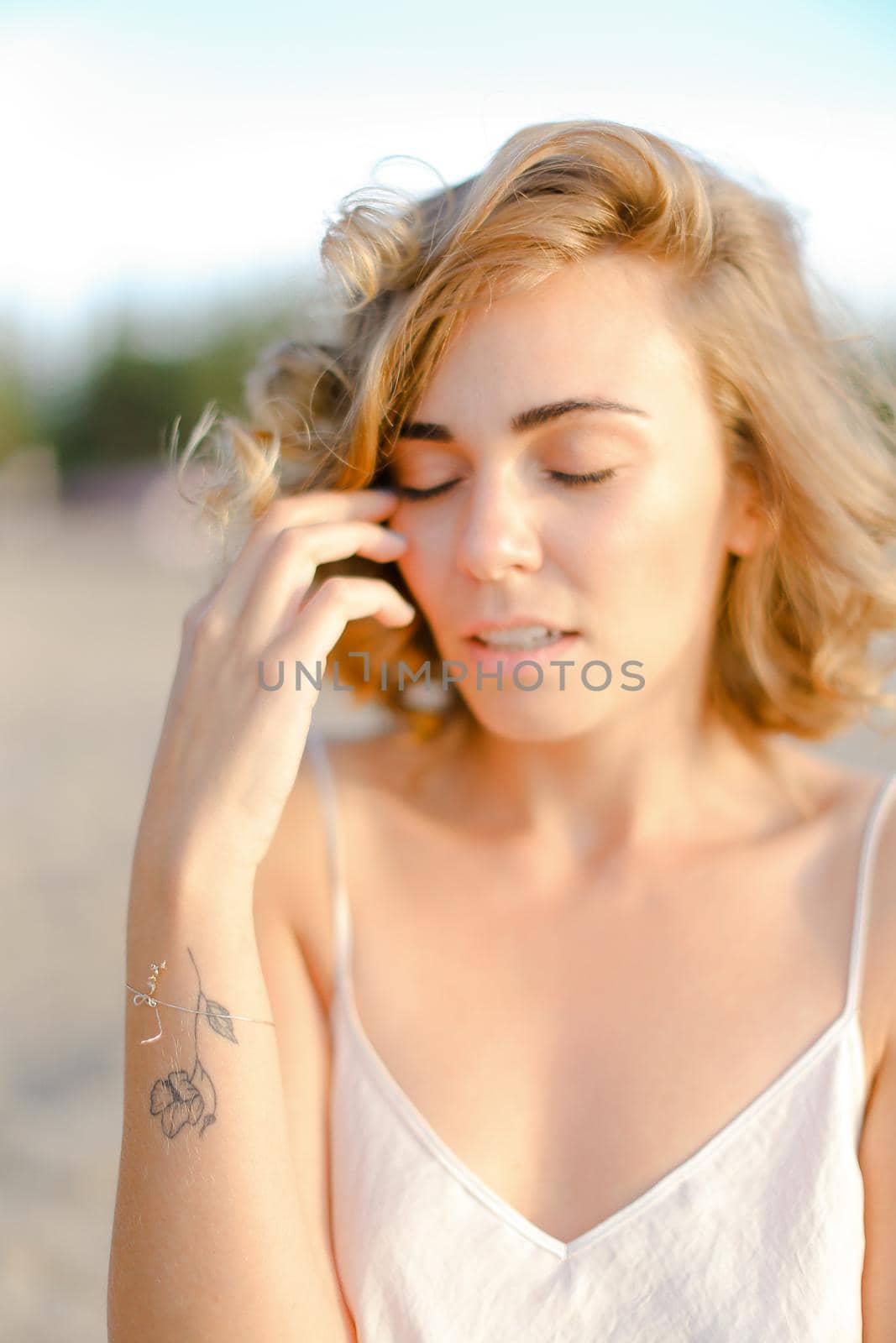 Close up portrait of young blonde nice woman without makeup. Concept of natural beauty and feamale person.