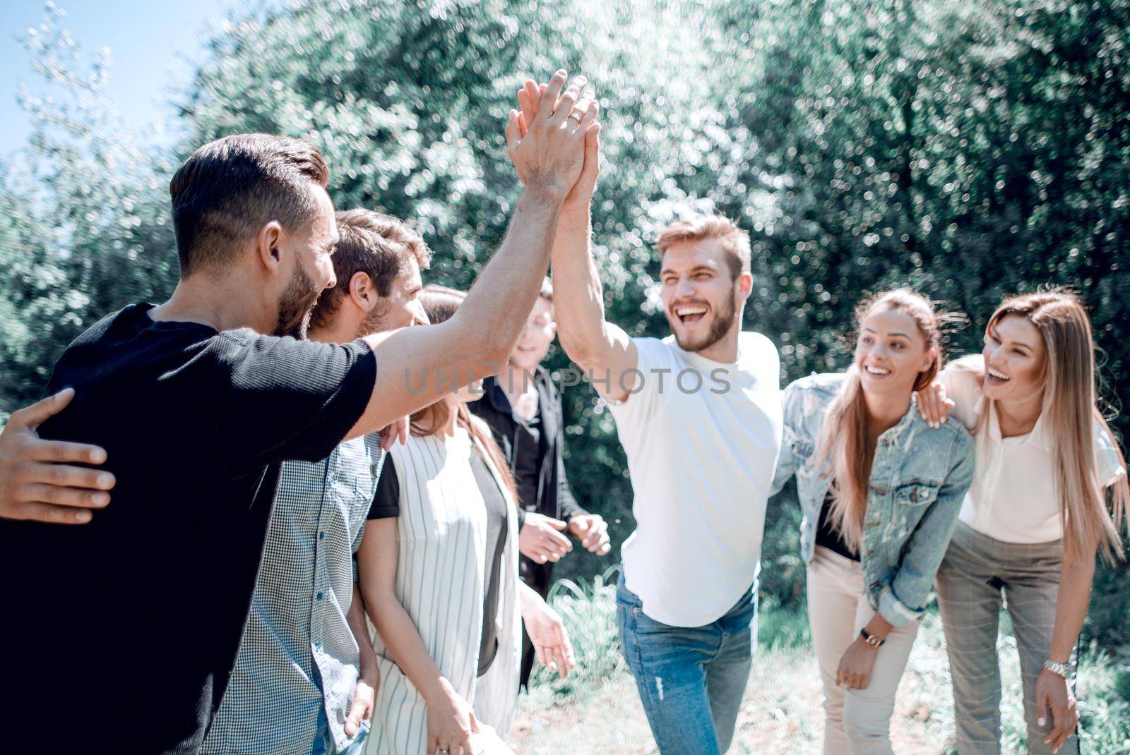 best friends give each other a high five.the concept of team building