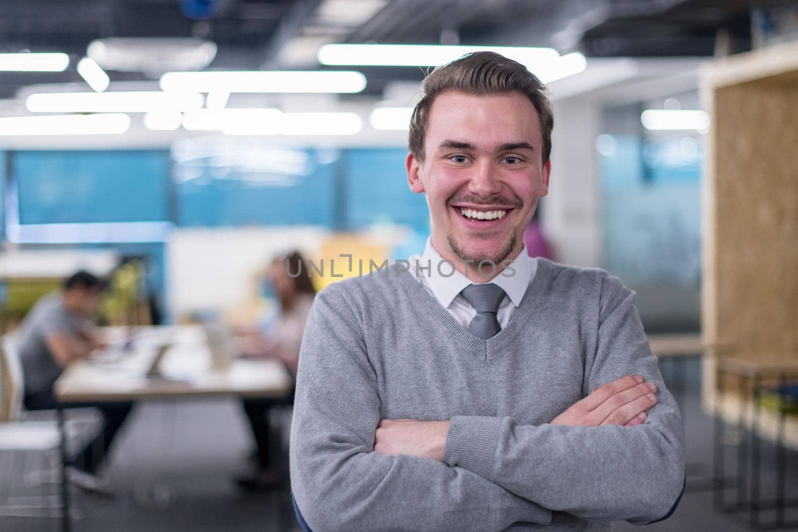 Portrait Of Successful Businessman Entrepreneur At Busy startup Office