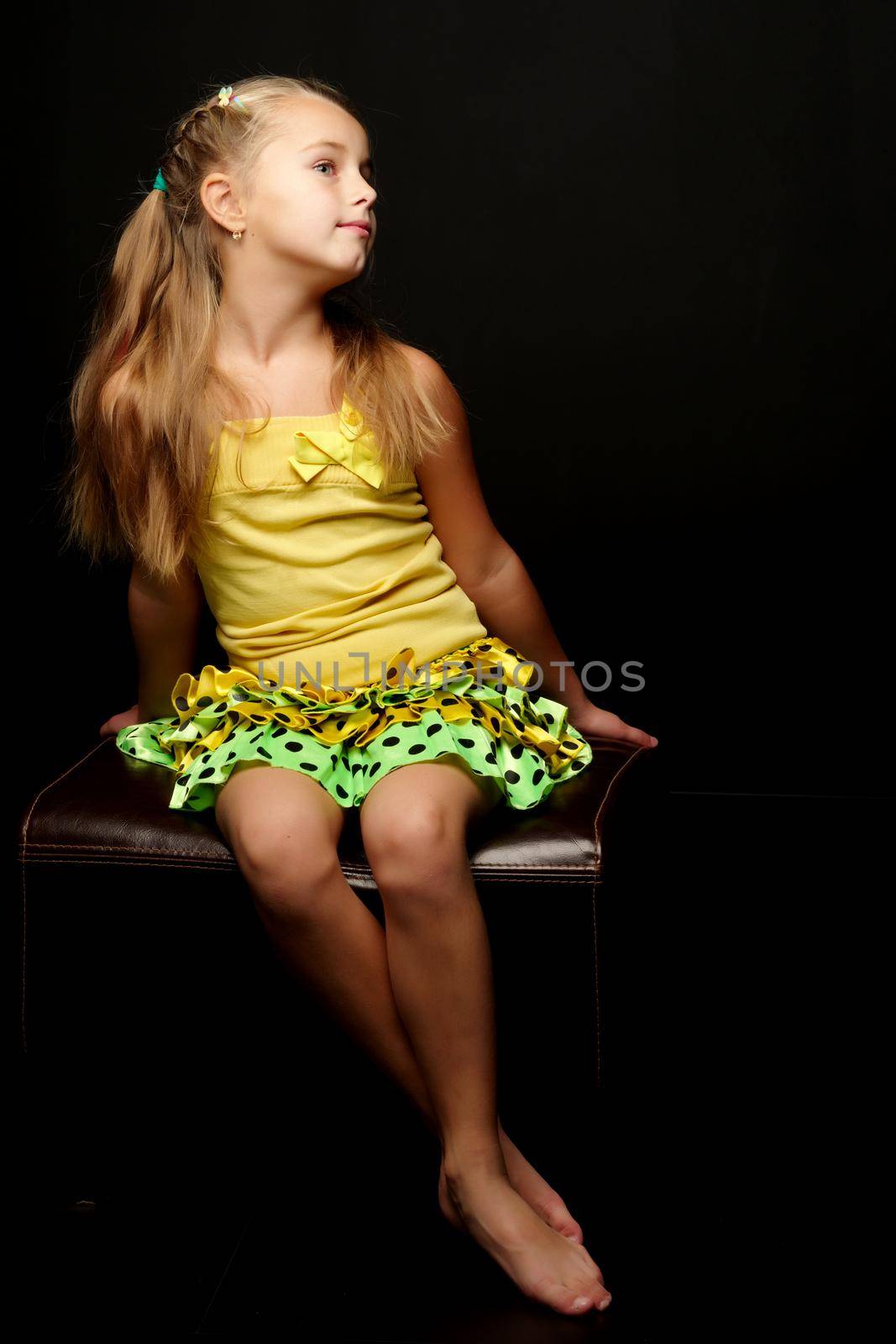 Little girl on a black background by kolesnikov_studio