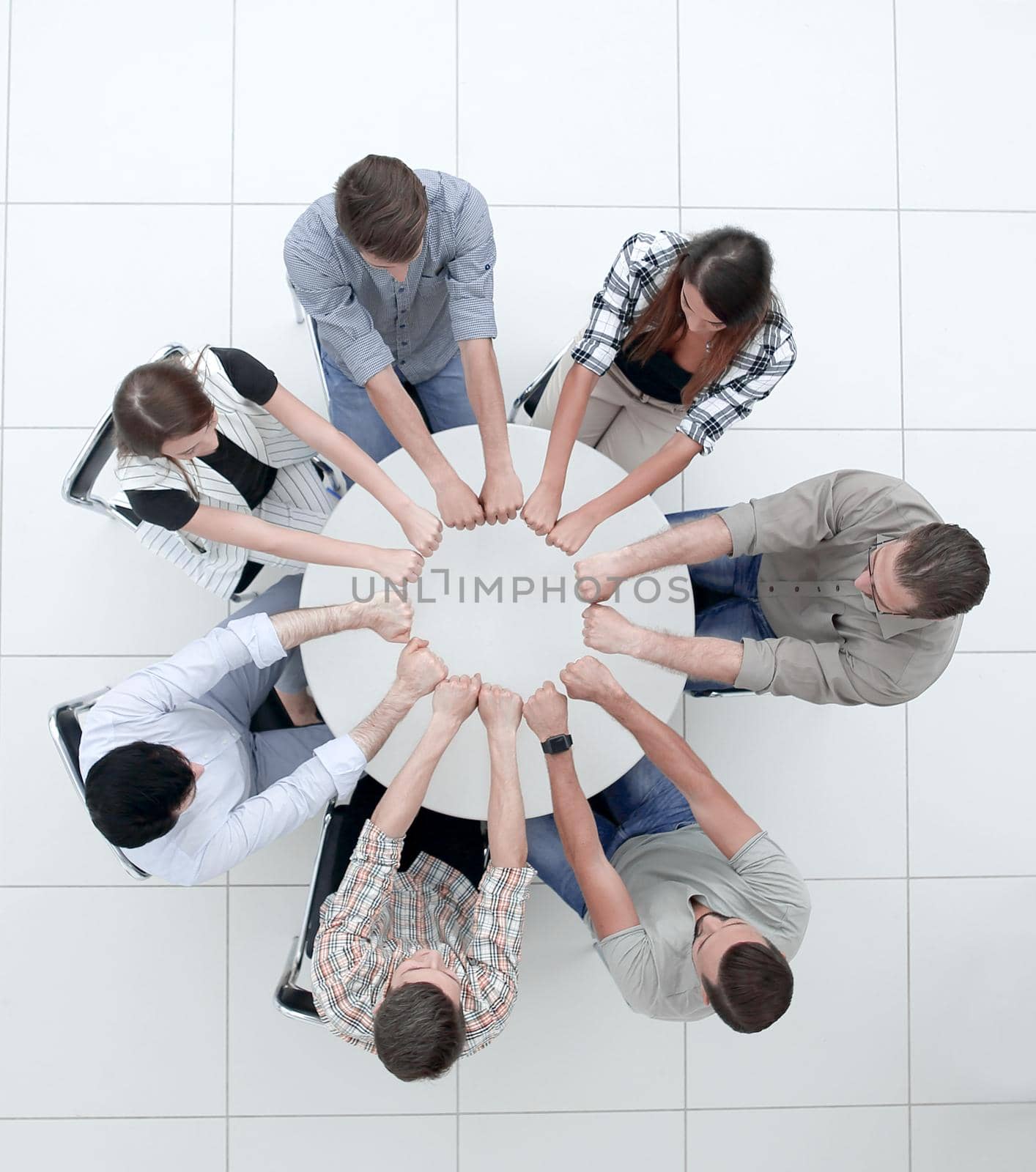 top view.professional business team showing its unity.the concept of teamwork