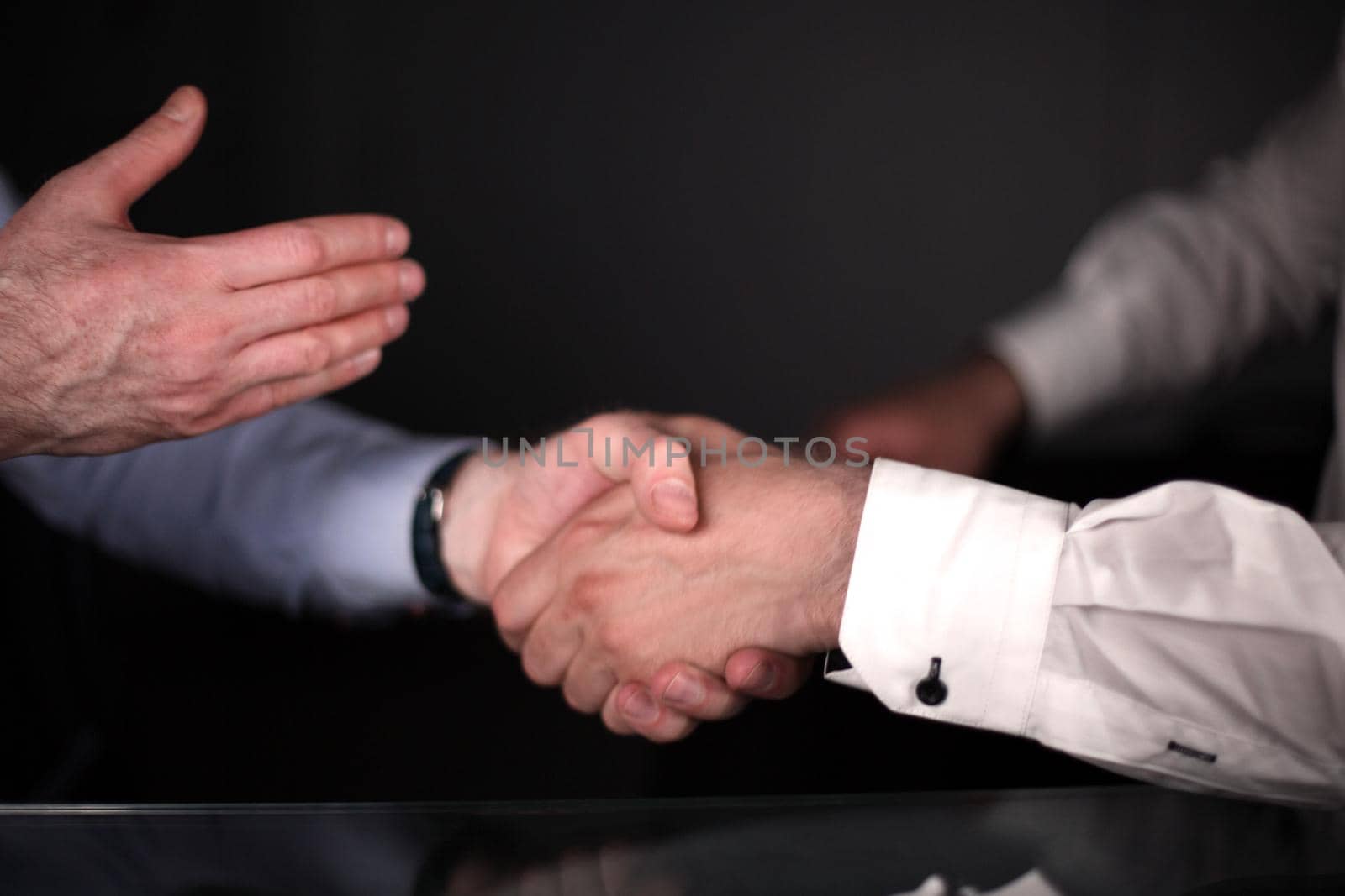 close up. a solid business handshake. business concept