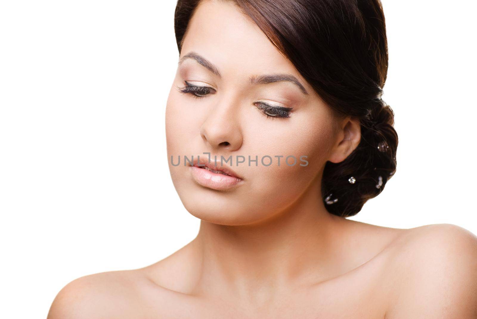Close-up portrait of sexy caucasian young woman on white background
