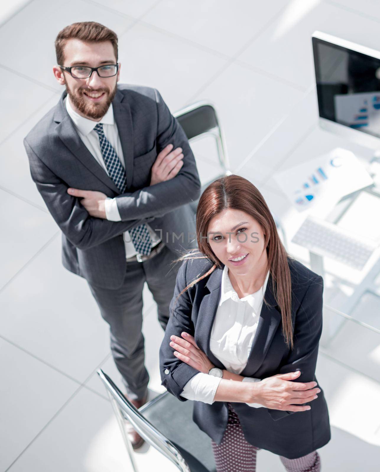 top view. three employees standing in the office. the concept of professionalism