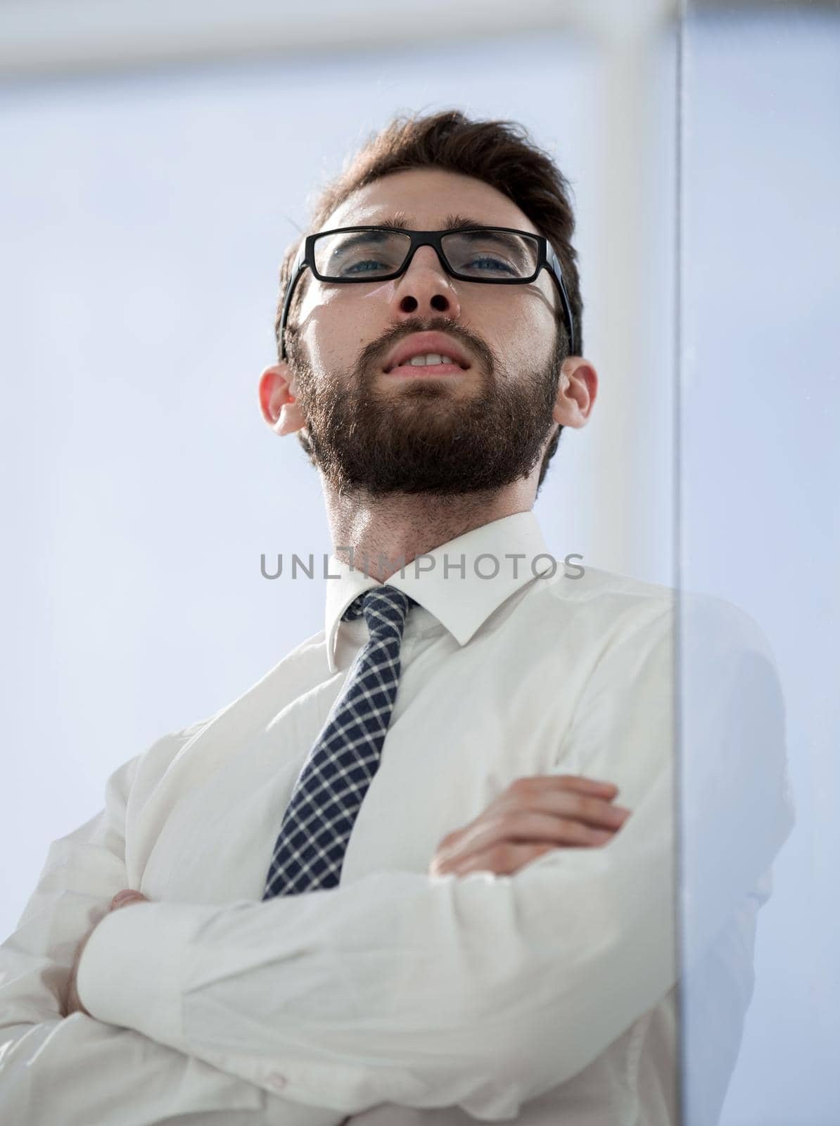 close up.portrait of a successful young businessman. by asdf