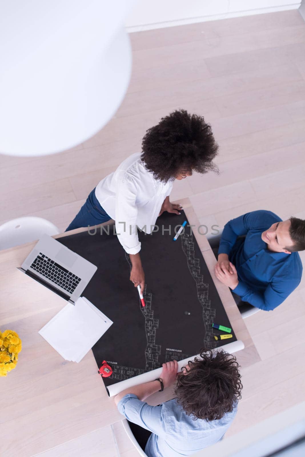 top view of Multiethnic startup business team on meeting by dotshock