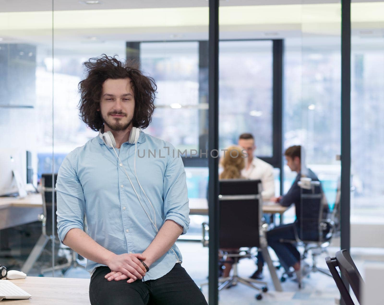 Portrait Of Successful Businessman Entrepreneur At Busy startup Office