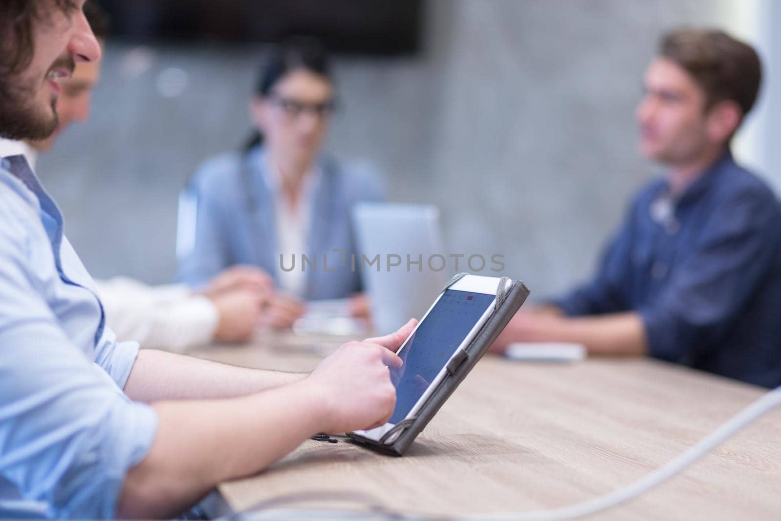 businessman using tablet computer by dotshock