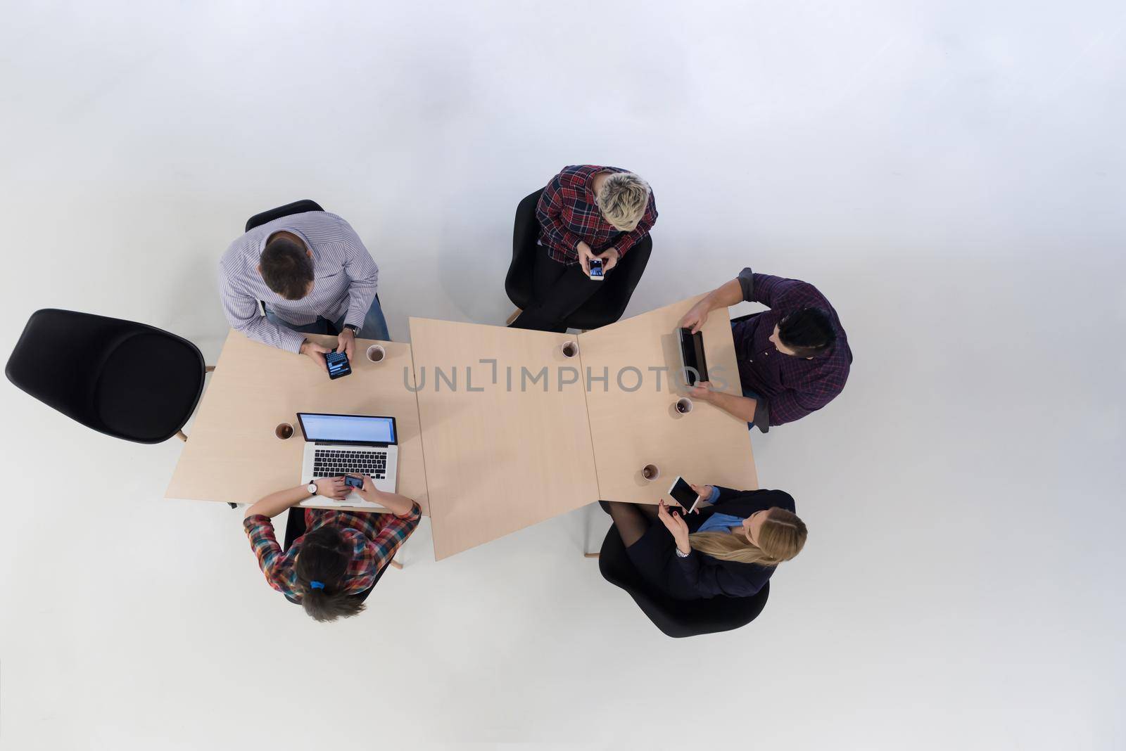 top view of multi ethnic startup business people group on brainstorming meeting in modern bright office interior