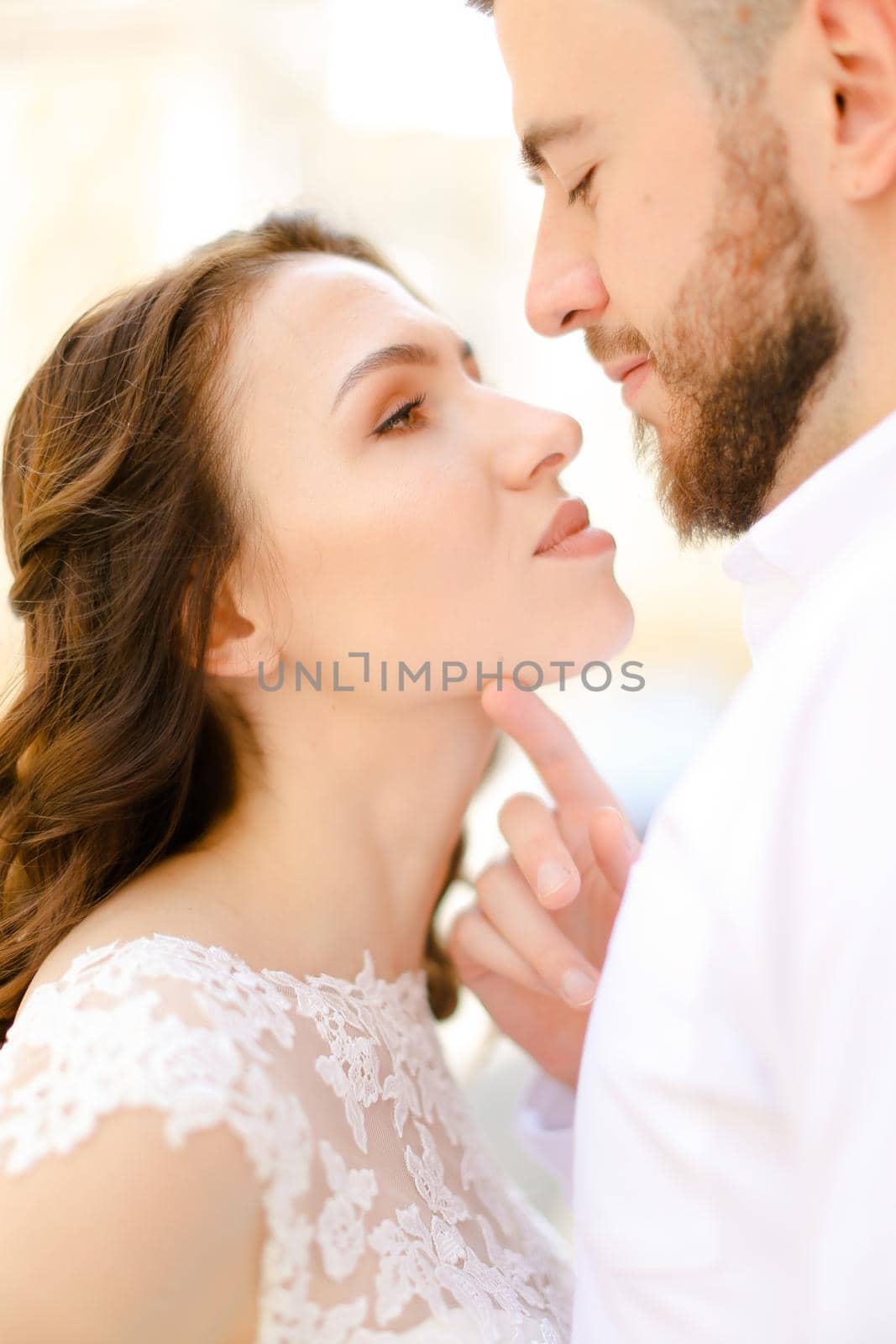 Portrait of caucasian happy married couple. Concept of wedding, tenderness and love.