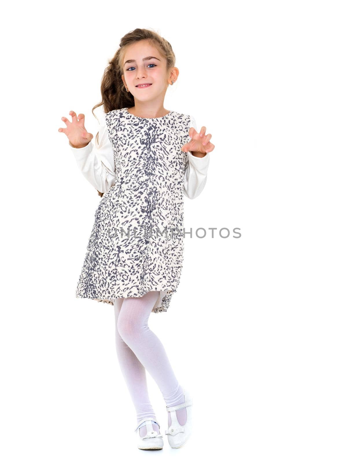 Joyful girl with arms raised. by kolesnikov_studio