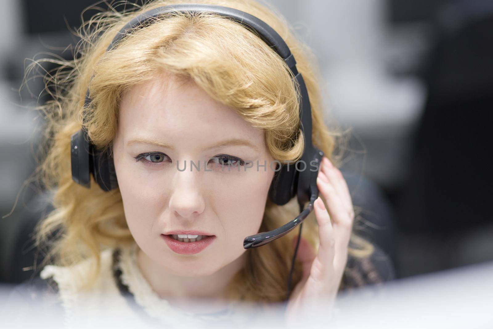 female call centre operator doing her job by dotshock
