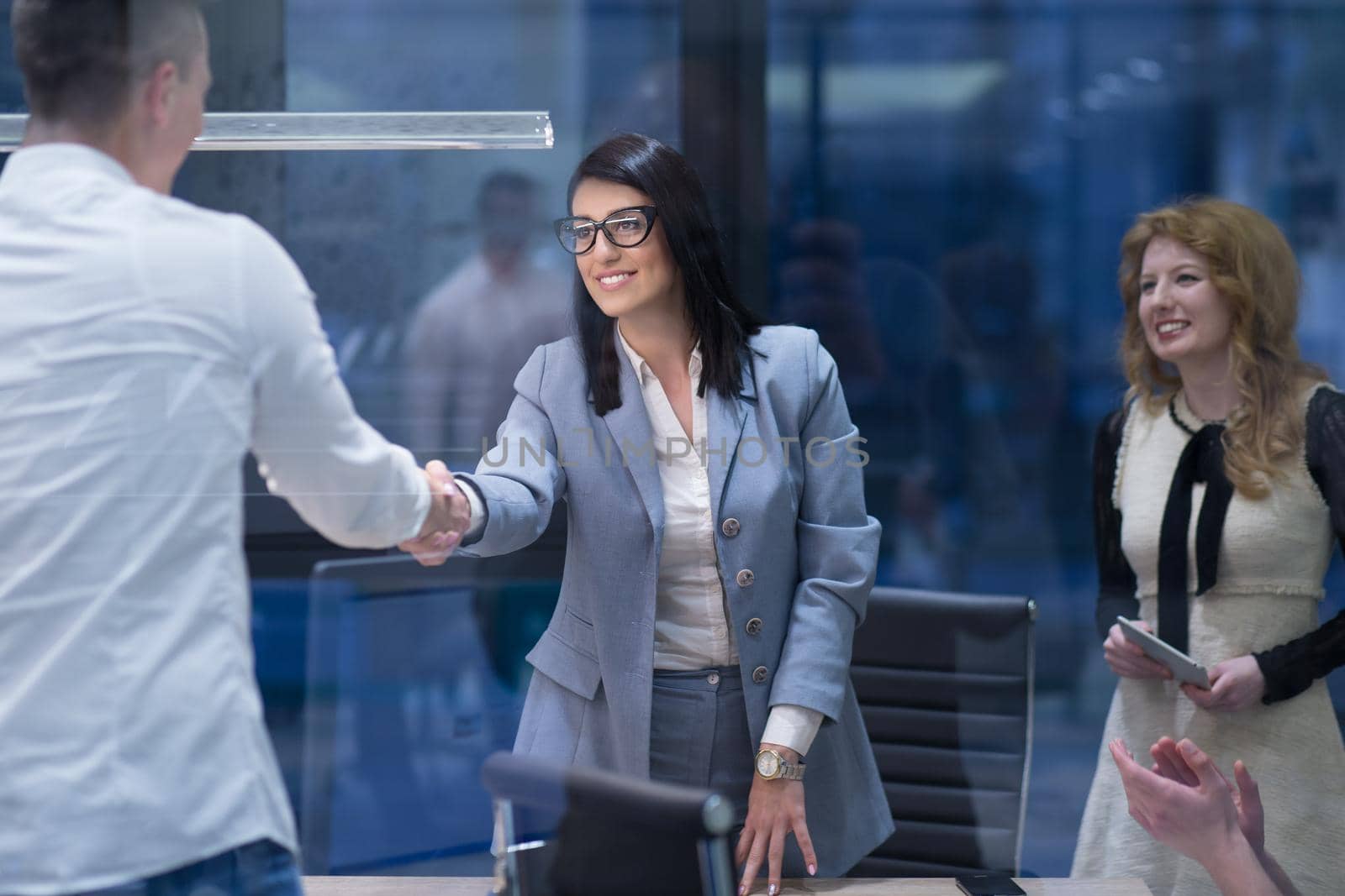 Business Partner Shake Hands on meetinig in modern office building