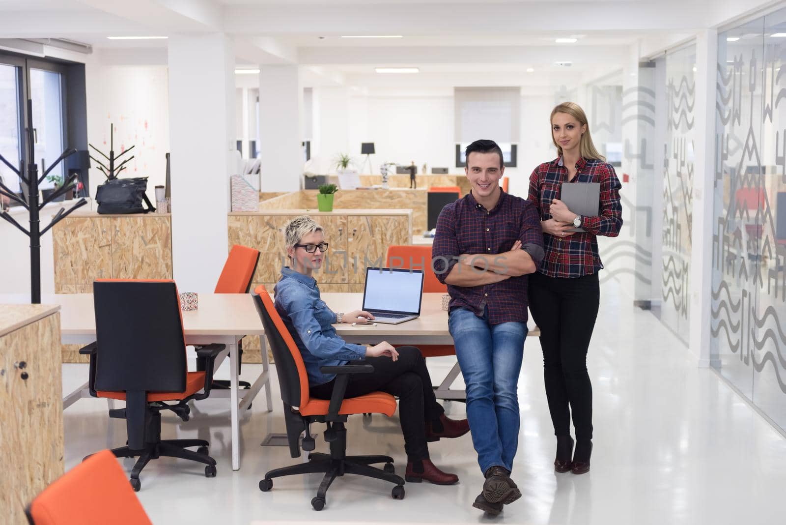 portrait of creative business people group in modern startup office interior