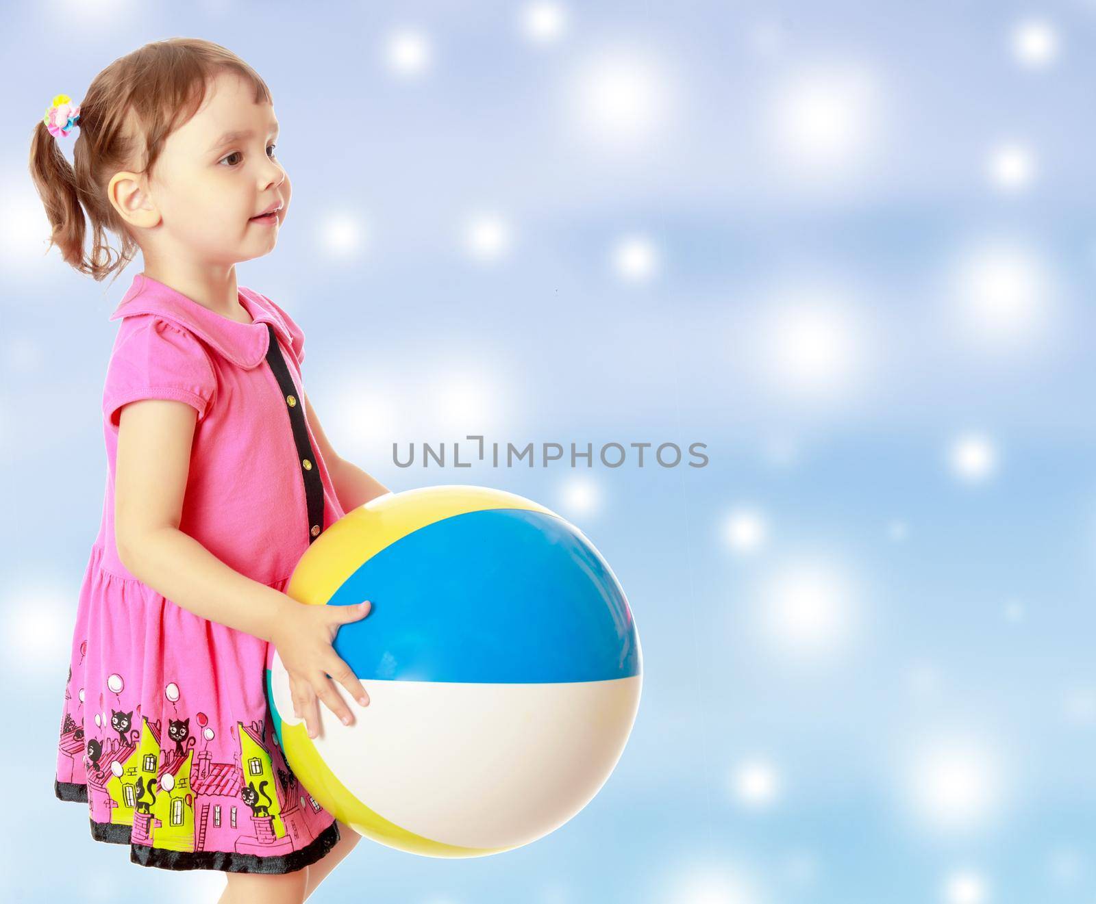 The little girl throws the ball by kolesnikov_studio