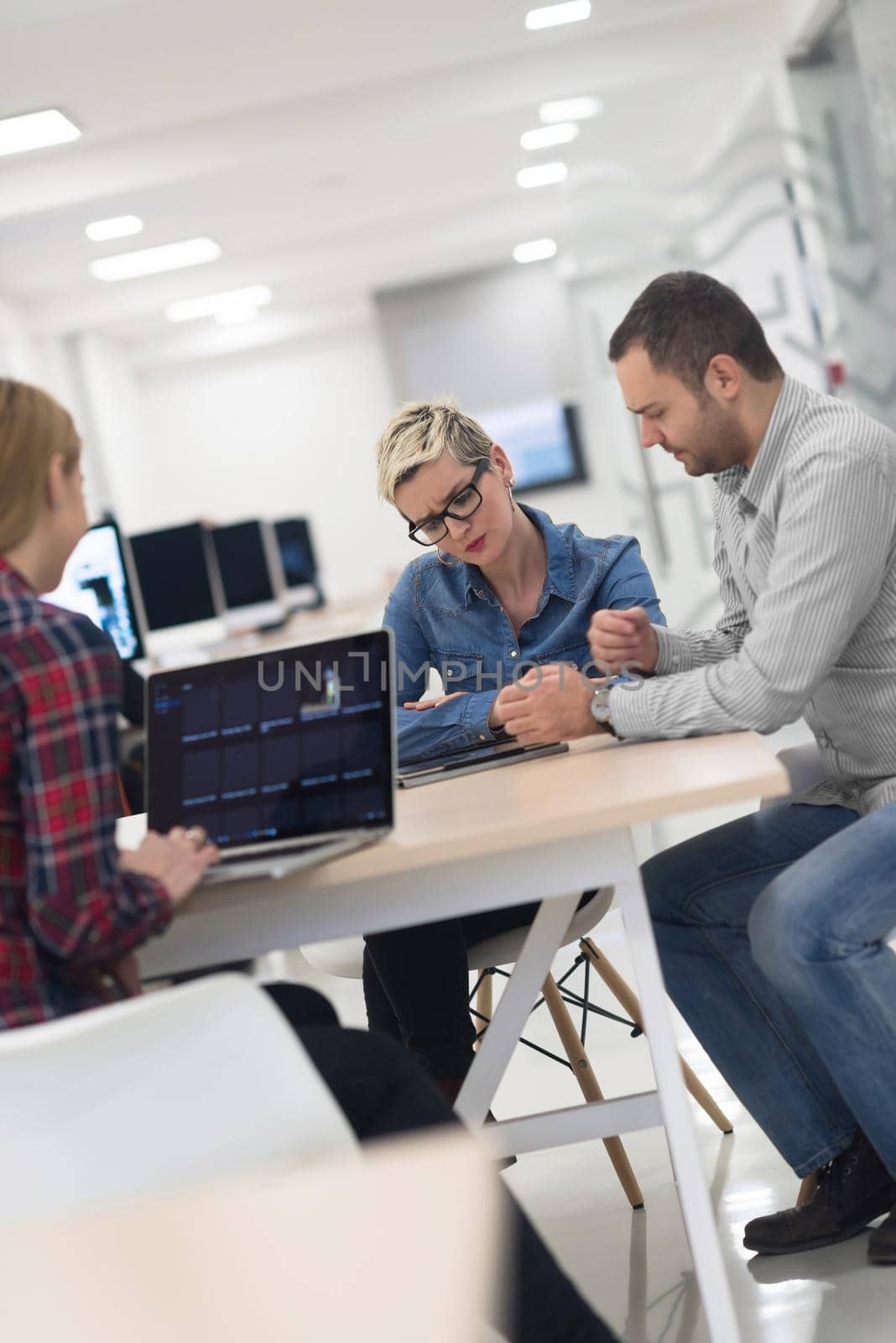 startup business team on meeting at modern office by dotshock